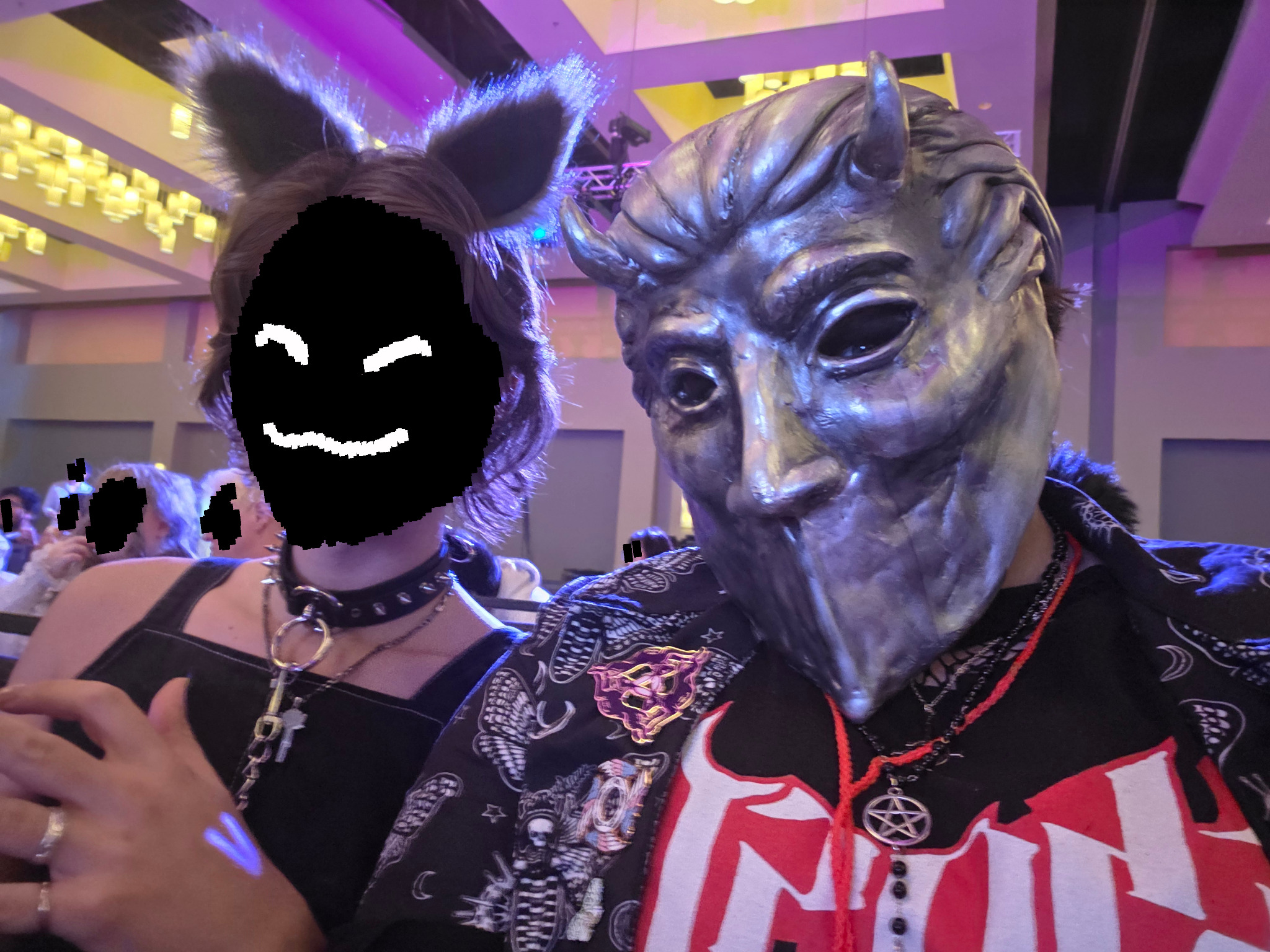 Tiercel Green in a Nameless Ghoul Mask next to a friend who's identity is protected by a black blob with a poorly drawn ^w^ face